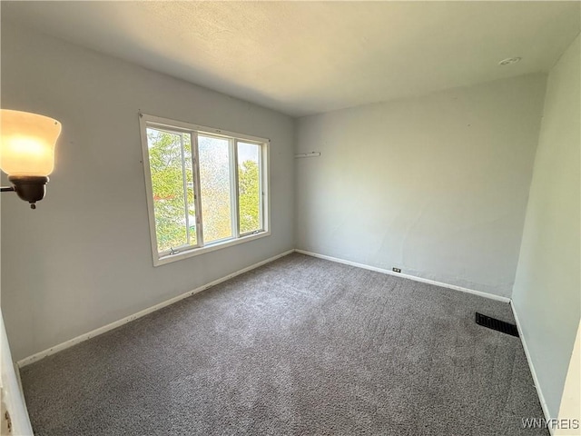 49 Massachusetts Ave, Buffalo, NY 14213 - carpeted empty room featuring baseboards