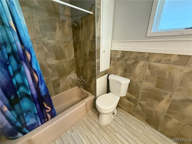 49 Massachusetts Ave, Buffalo, NY 14213 - bathroom with tile walls, shower / tub combo, and wainscoting