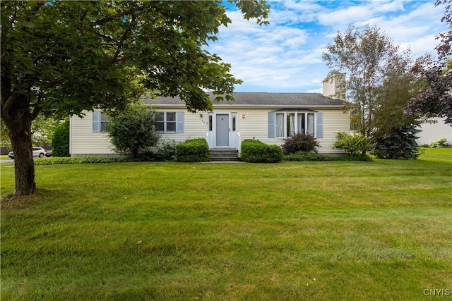 42 Park Ter, Sherrill, NY 13461 - ranch-style home with a chimney and a front yard