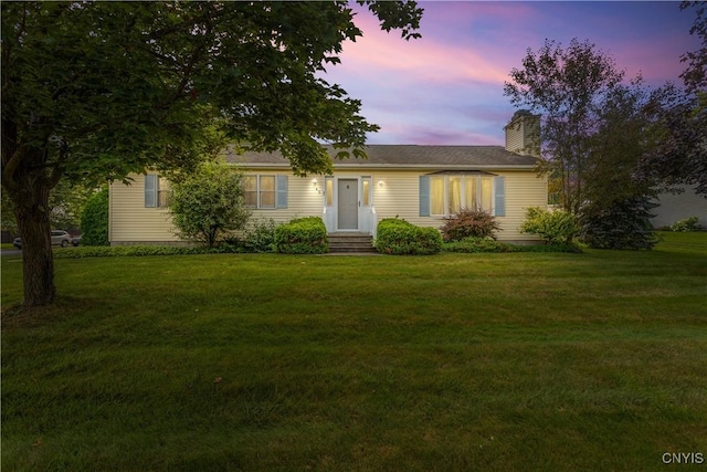 42 Park Ter, Sherrill, NY 13461 - ranch-style home featuring a front yard and a chimney