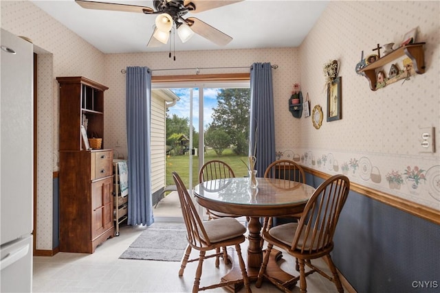 42 Park Ter, Sherrill, NY 13461 - dining room with wallpapered walls and a ceiling fan