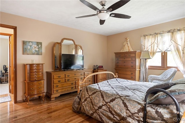 42 Park Ter, Sherrill, NY 13461 - bedroom with wood finished floors and a ceiling fan
