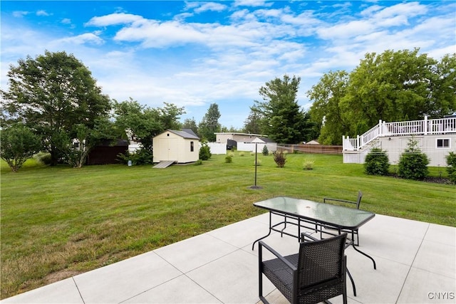 42 Park Ter, Sherrill, NY 13461 - view of patio featuring outdoor dining area and a storage unit