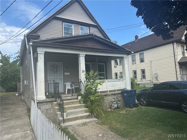 38 Langmeyer Ave, Buffalo, NY 14215 - view of front of house featuring a porch and a front lawn