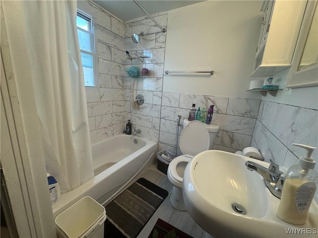 38 Langmeyer Ave, Buffalo, NY 14215 - bathroom with tile walls and shower / tub combo with curtain
