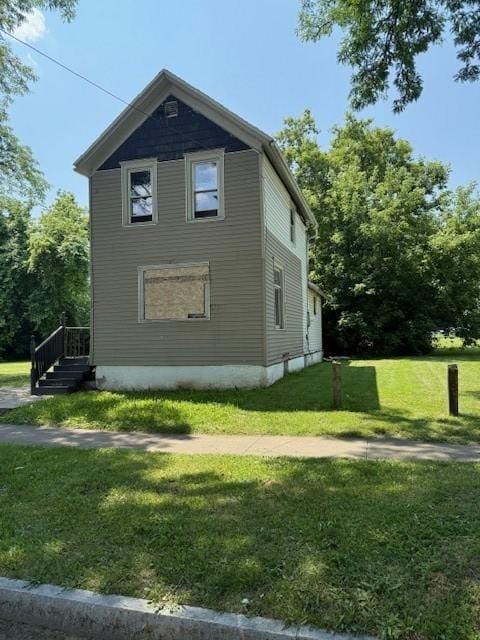 127 Conkey Ave, Rochester, NY 14621 - view of home's exterior with a yard