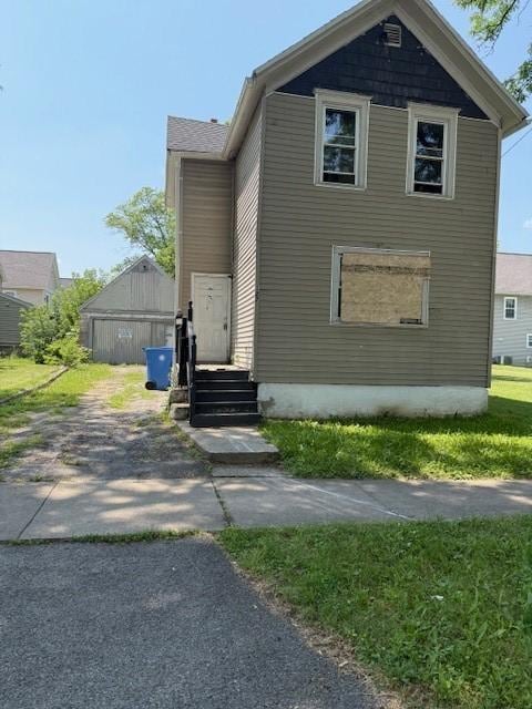 127 Conkey Ave, Rochester, NY 14621 - view of front facade featuring driveway