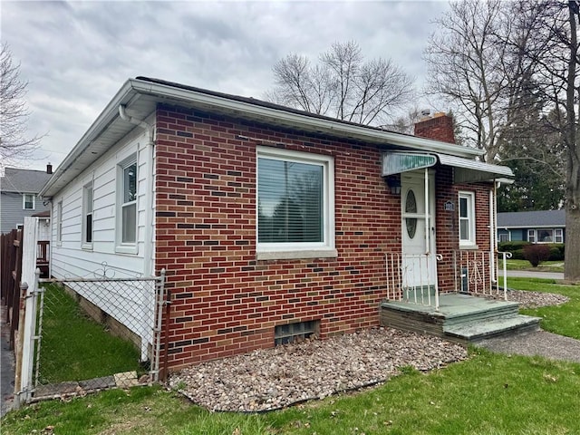 2201 Dewey Ave, Rochester, NY 14615 - view of front of property with brick siding and a chimney