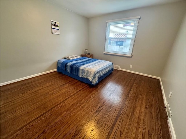 2201 Dewey Ave, Rochester, NY 14615 - bedroom featuring wood finished floors and baseboards