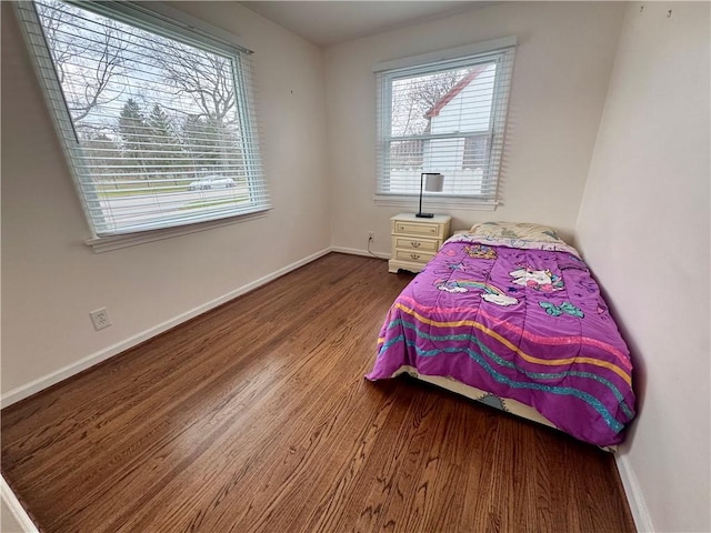 2201 Dewey Ave, Rochester, NY 14615 - bedroom with wood finished floors and baseboards
