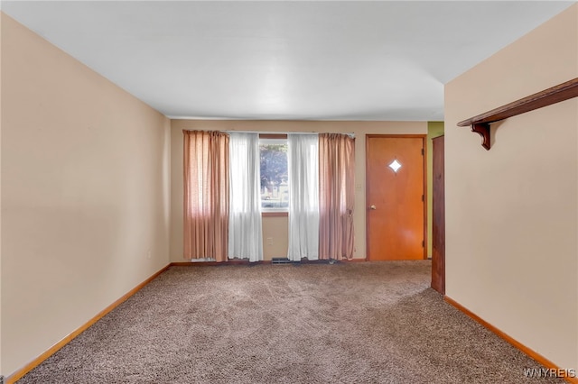 85 Pacific Ave, Lackawanna, NY 14218 - carpeted empty room with baseboards