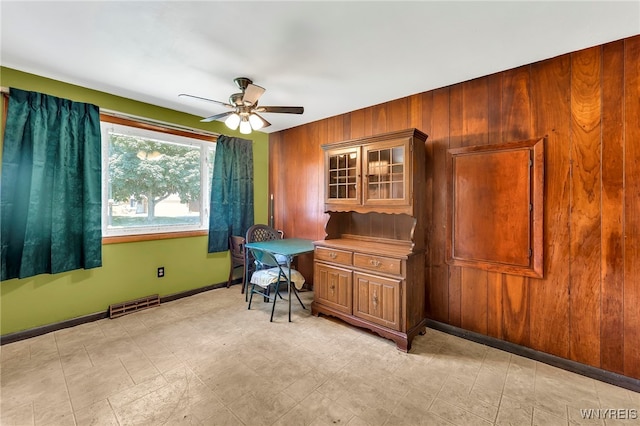 85 Pacific Ave, Lackawanna, NY 14218 - office with ceiling fan and wood walls