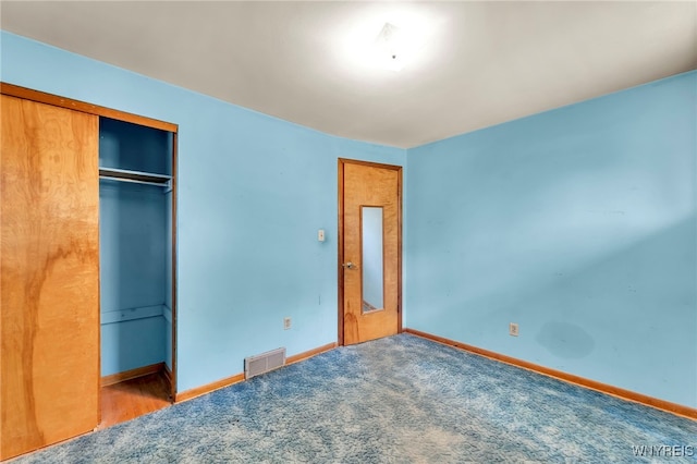 85 Pacific Ave, Lackawanna, NY 14218 - unfurnished bedroom featuring a closet and carpet flooring