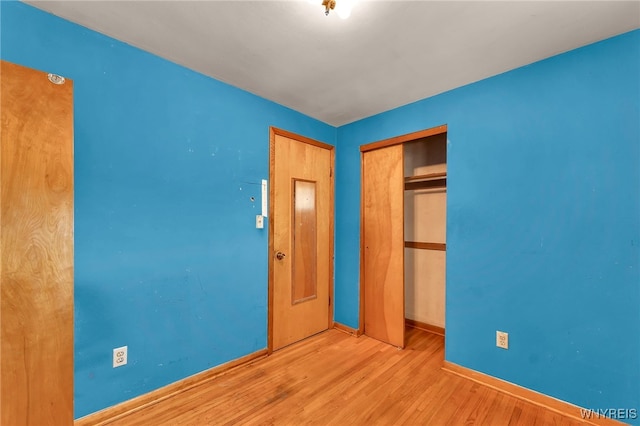 85 Pacific Ave, Lackawanna, NY 14218 - unfurnished bedroom with a closet and wood finished floors