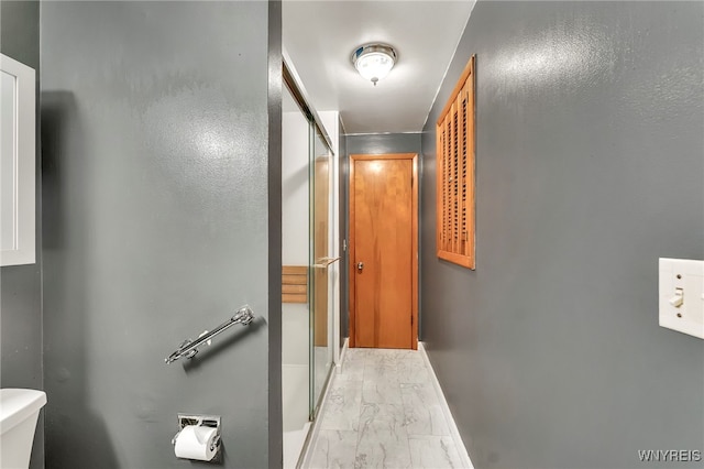 85 Pacific Ave, Lackawanna, NY 14218 - corridor with light marble finish flooring and baseboards