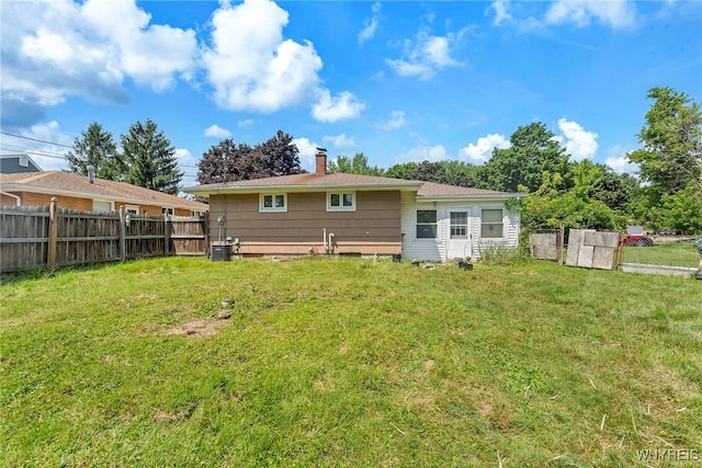 85 Pacific Ave, Lackawanna, NY 14218 - rear view of property with a fenced backyard and a chimney