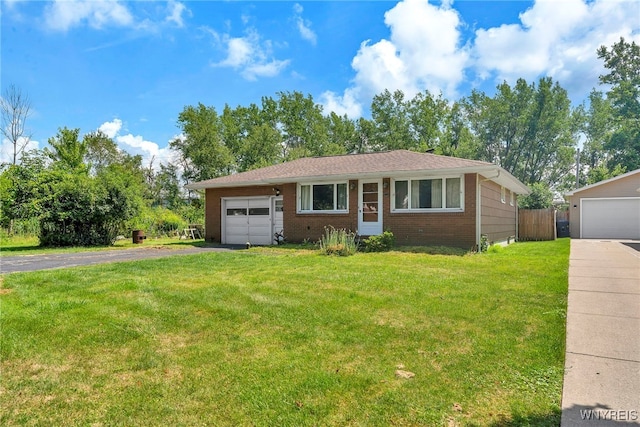 85 Pacific Ave, Lackawanna, NY 14218 - view of front of home featuring asphalt driveway, an attached garage, and brick siding