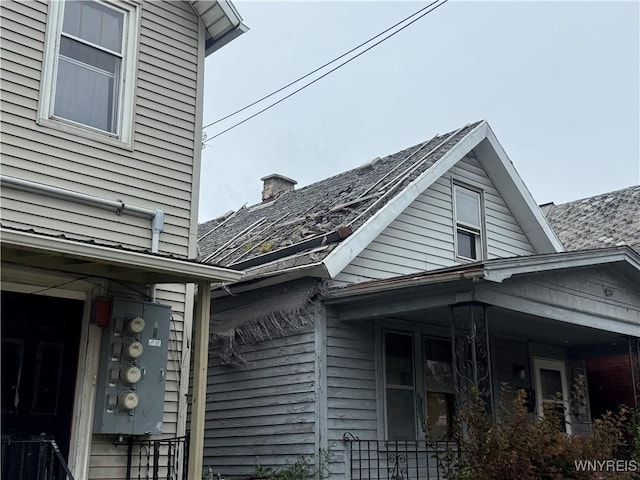 11 Minton St, Buffalo, NY 14210 - view of home's exterior with a chimney