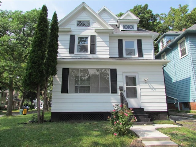 176 Selye Ter, Rochester, NY 14613 - view of front facade featuring entry steps and a front lawn