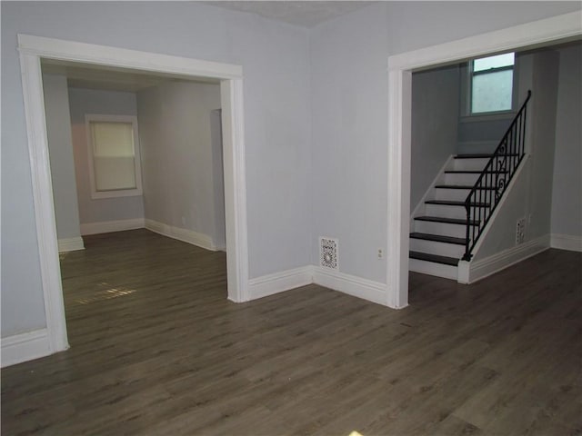 176 Selye Ter, Rochester, NY 14613 - unfurnished room with dark wood-style floors and stairs