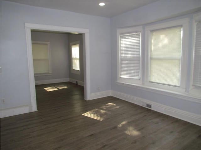 176 Selye Ter, Rochester, NY 14613 - spare room with dark wood finished floors and plenty of natural light