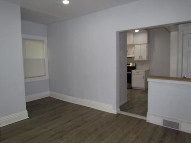 176 Selye Ter, Rochester, NY 14613 - empty room with dark wood finished floors and recessed lighting