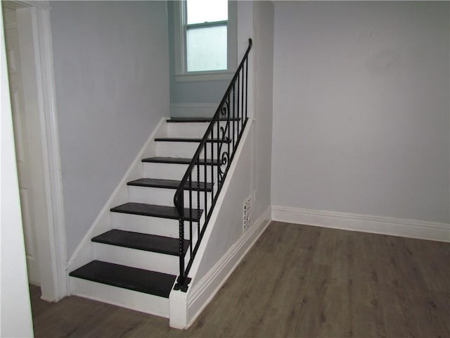 176 Selye Ter, Rochester, NY 14613 - staircase featuring wood finished floors and baseboards