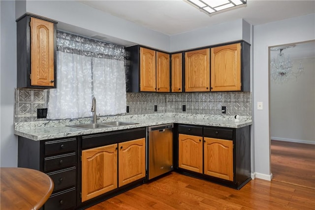 15 Dogwood Ln, Erwin, NY 14870 - kitchen with dark wood-style floors, tasteful backsplash, stainless steel dishwasher, and brown cabinets