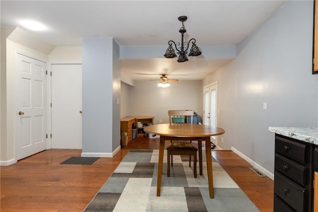 15 Dogwood Ln, Erwin, NY 14870 - dining area featuring a chandelier, wood finished floors, and ceiling fan