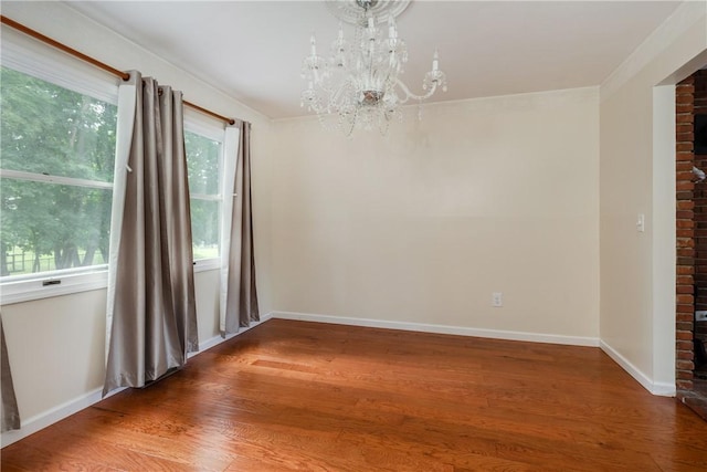 15 Dogwood Ln, Erwin, NY 14870 - empty room featuring a chandelier and wood finished floors