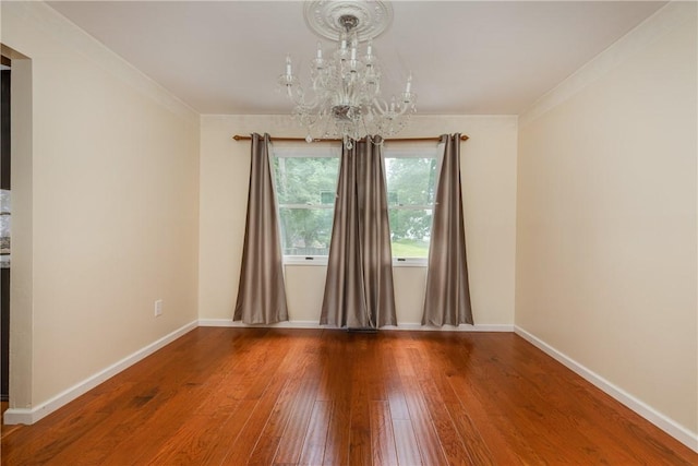 15 Dogwood Ln, Erwin, NY 14870 - empty room featuring a chandelier, wood-type flooring, and crown molding