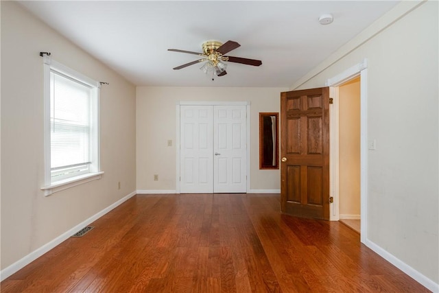 15 Dogwood Ln, Erwin, NY 14870 - unfurnished bedroom with wood finished floors, a closet, and ceiling fan