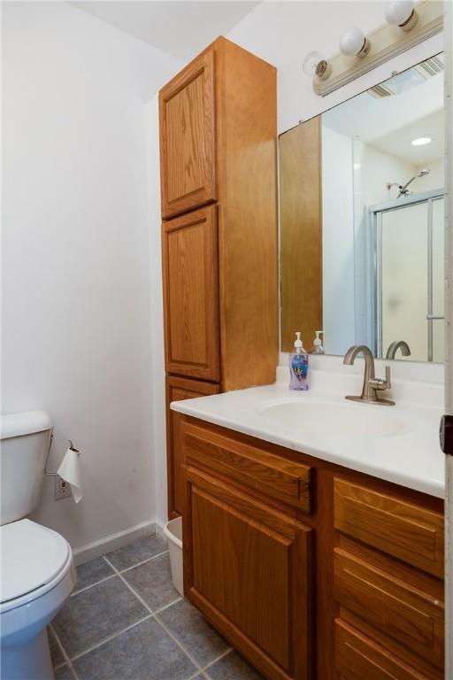 15 Dogwood Ln, Erwin, NY 14870 - full bathroom featuring vanity, a shower stall, and tile patterned floors