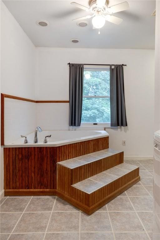 15 Dogwood Ln, Erwin, NY 14870 - bathroom with a bath, a ceiling fan, and tile patterned floors