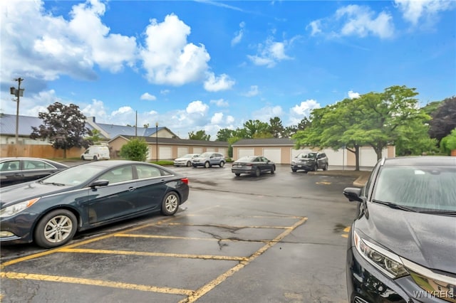 306 Sundown Unit 3C, Amherst, NY 14221 - uncovered parking lot with a residential view