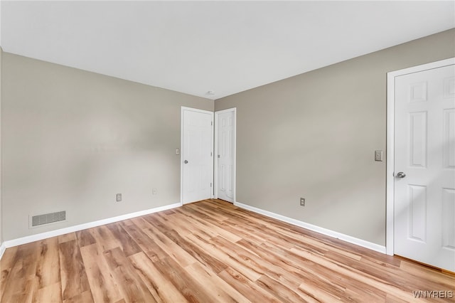306 Sundown Unit 3C, Amherst, NY 14221 - unfurnished room featuring baseboards and light wood-style floors