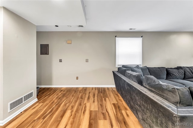 306 Sundown Unit 3C, Amherst, NY 14221 - living area featuring light wood-type flooring and electric panel