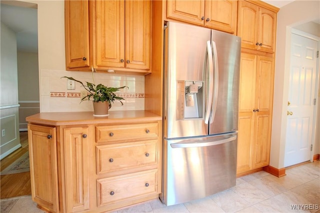 73 Eaglebrook Dr, Orchard Park, NY 14224 - kitchen featuring stainless steel refrigerator with ice dispenser, light countertops, and backsplash
