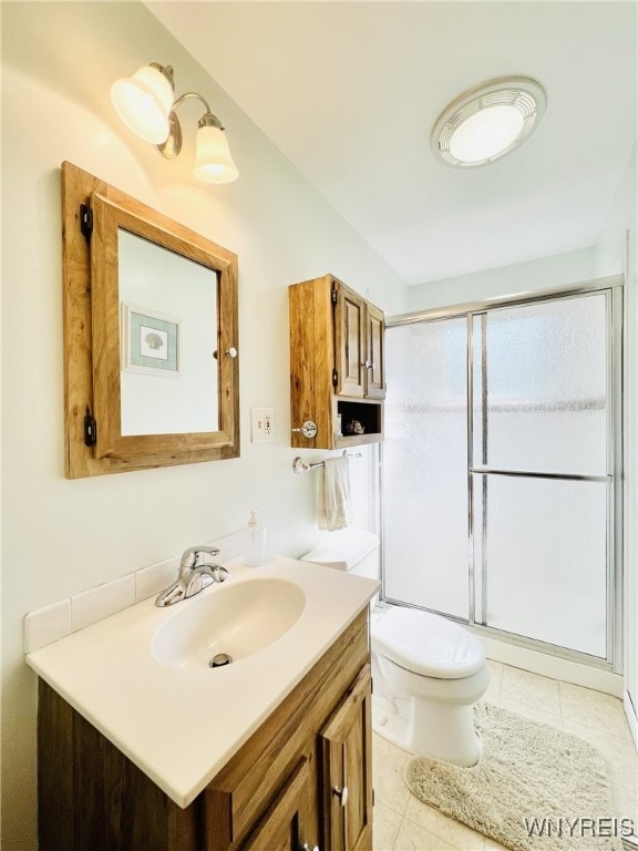 73 Eaglebrook Dr, Orchard Park, NY 14224 - full bath with vanity, a shower with shower door, and tile patterned flooring