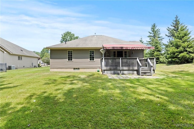 6 Fair Woods Dr, Amherst, NY 14221 - back of house with a deck, a lawn, and a shingled roof