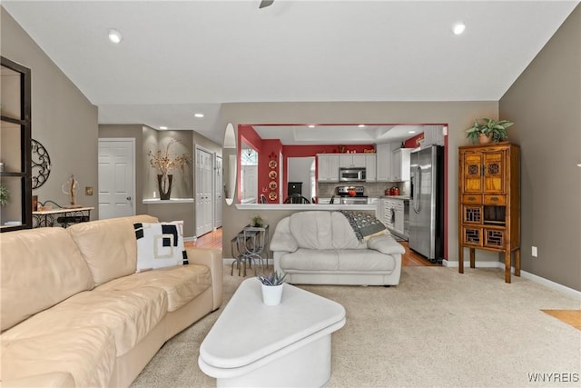 6 Fair Woods Dr, Amherst, NY 14221 - living room with light colored carpet, recessed lighting, and arched walkways