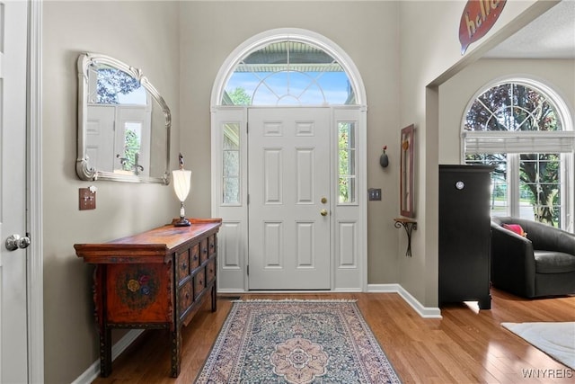6 Fair Woods Dr, Amherst, NY 14221 - entrance foyer with wood finished floors and a high ceiling