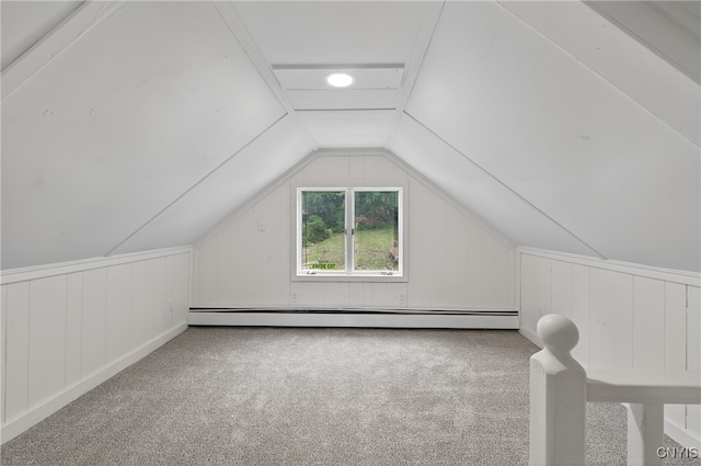215 Vann St, Syracuse, NY 13206 - additional living space featuring carpet floors, vaulted ceiling, and a baseboard radiator