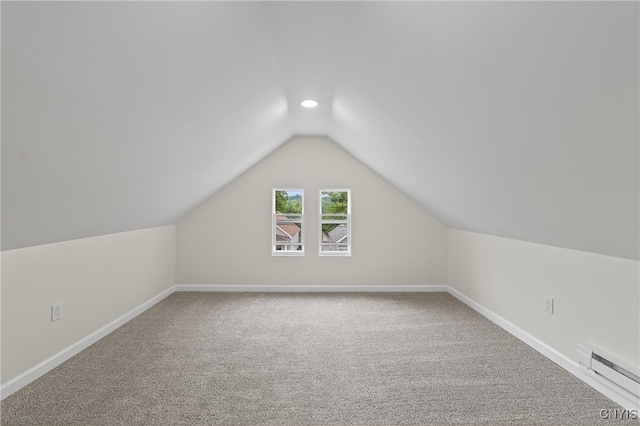 215 Vann St, Syracuse, NY 13206 - additional living space with vaulted ceiling, a baseboard heating unit, carpet floors, and recessed lighting