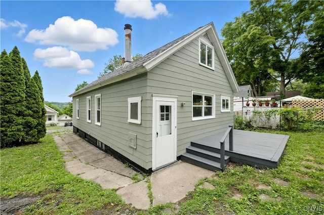 215 Vann St, Syracuse, NY 13206 - rear view of property featuring a deck and a shingled roof