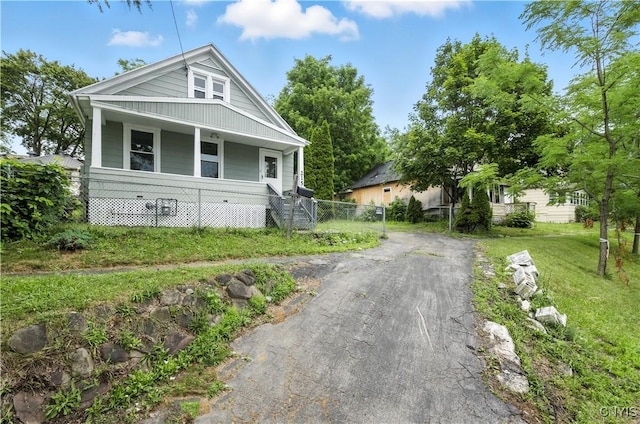 215 Vann St, Syracuse, NY 13206 - view of front of property with covered porch and asphalt driveway