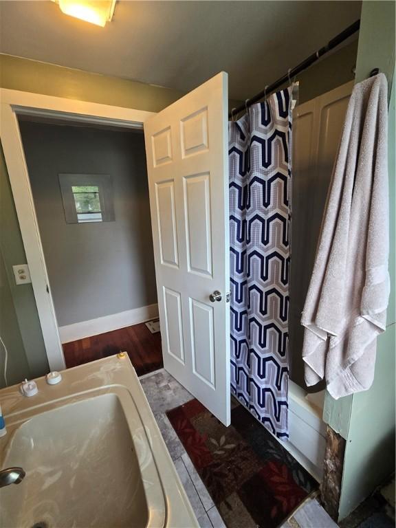 262 E 3rd St, Corning City, NY 14830 - full bath with a shower with shower curtain and a sink