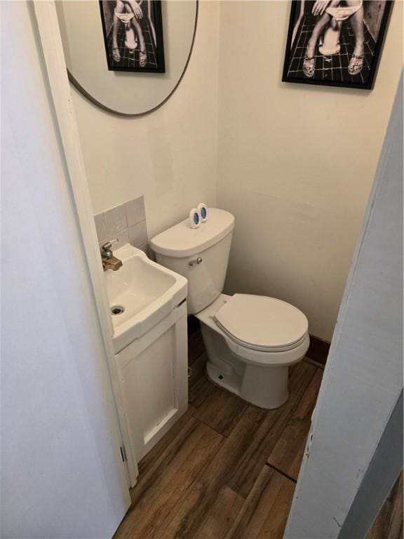 262 E 3rd St, Corning City, NY 14830 - bathroom featuring vanity and wood finished floors