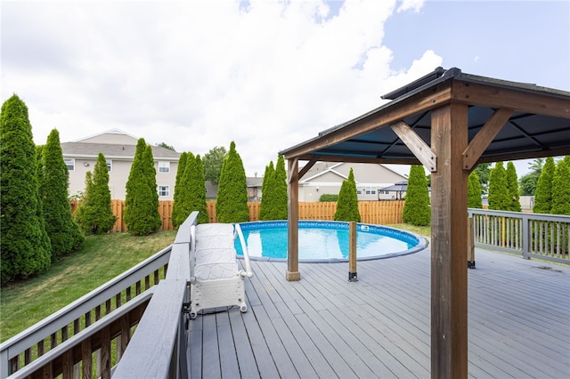 20 Parr Cir, Irondequoit, NY 14617 - view of pool with a wooden deck, a fenced backyard, and a gazebo