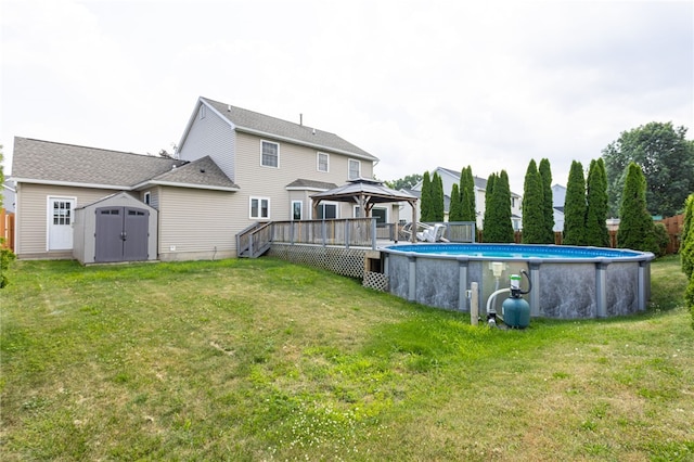 20 Parr Cir, Irondequoit, NY 14617 - back of house featuring a gazebo, a shed, a lawn, a deck, and an outdoor pool